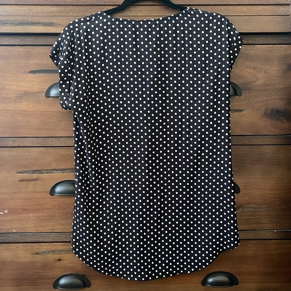 Size small, women’s Express black and white polkadot top with zipper. - Picture 5 of 5
